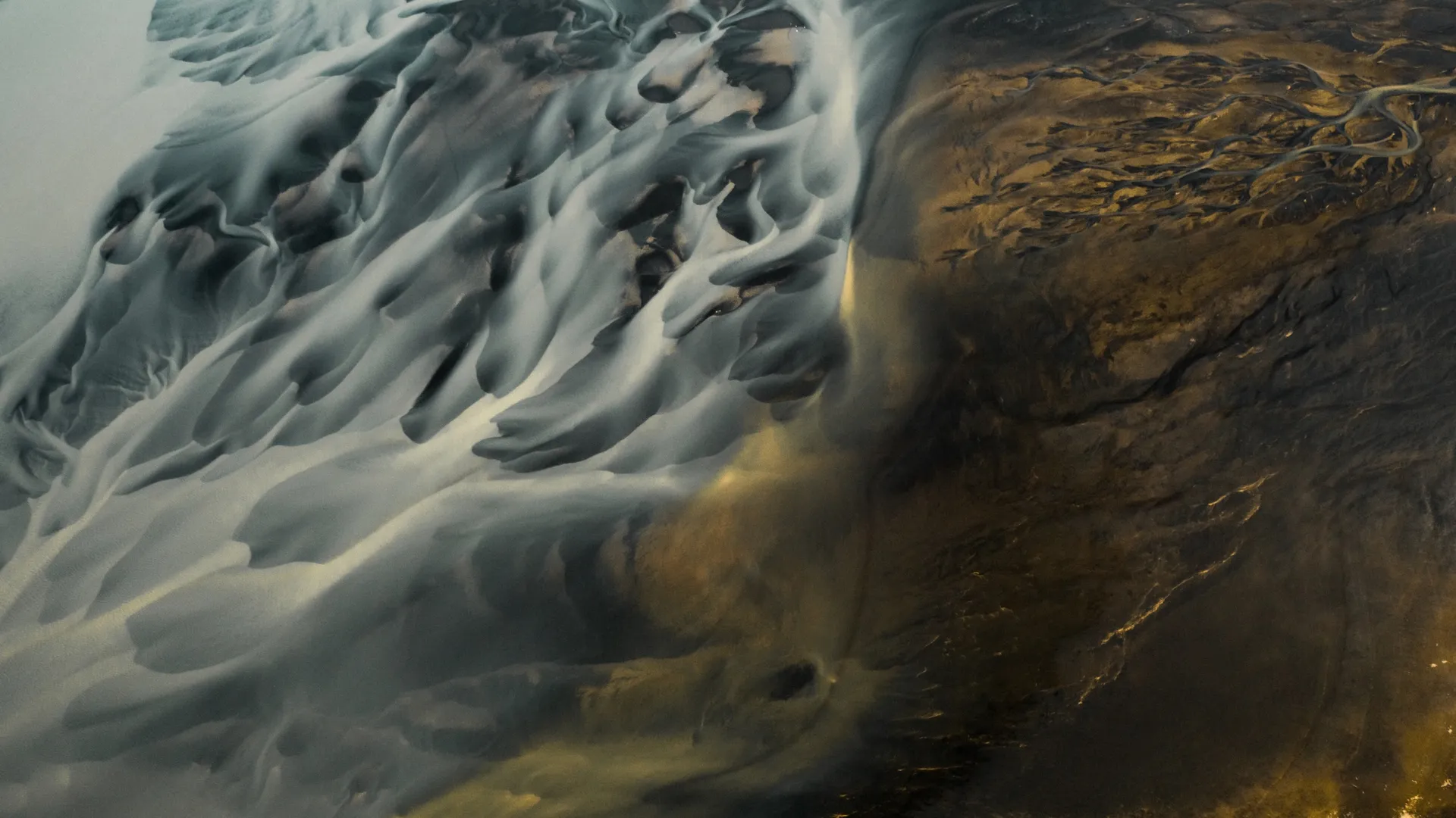 Abstract smoky black, gray, and ochre textures